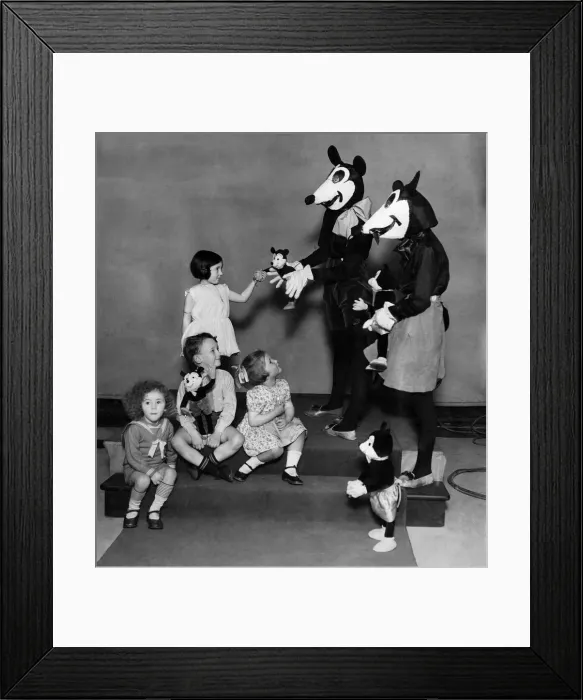 Framed Print : Winners of Mickey Mouse'week prizes at Russells Restaurant Leicester Square