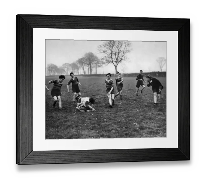 Framed Print : While the sports master is away fighting at thr front the sports mistress who usually Framed Print : While the sports master is away fighting at thr front the sports mistress who usually