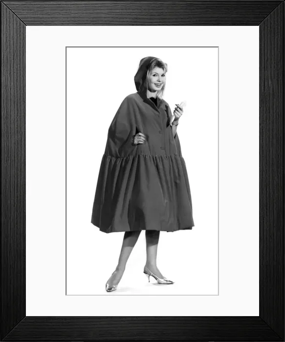 Framed Print : Reveille fashions 1962: Elizabeth Duke models coat December 1962 P011093 Framed Print : Reveille fashions 1962: Elizabeth Duke models coat December 1962 P011093