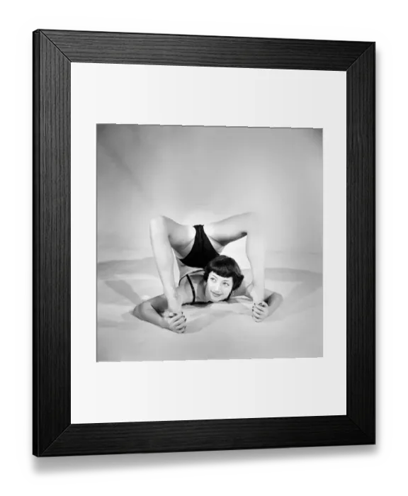 Framed Print : Entertainment Contortionist. Make no mistake about this girl - shes a twister Framed Print : Entertainment Contortionist. Make no mistake about this girl - shes a twister