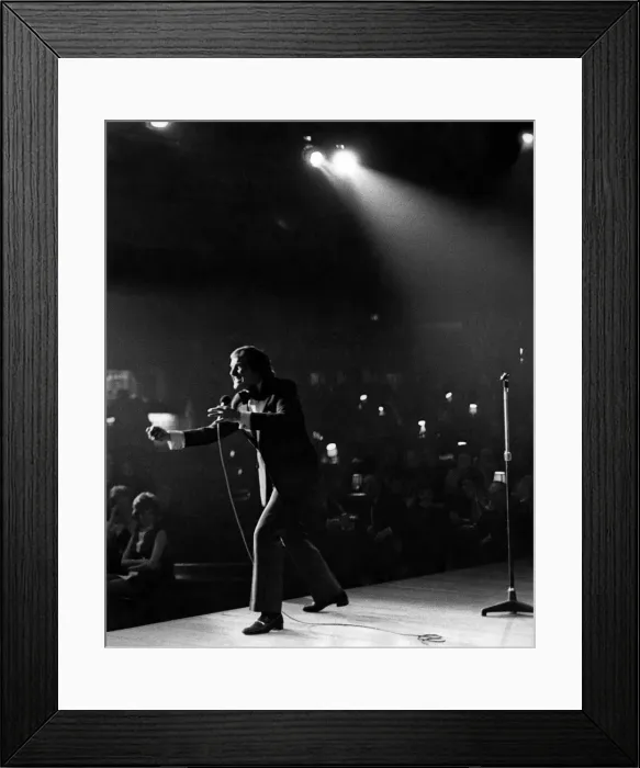 Framed Print : Master funster Bob Monkhouse holds forth on stage at the Wakefield Theatre Club Framed Print : Master funster Bob Monkhouse holds forth on stage at the Wakefield Theatre Club