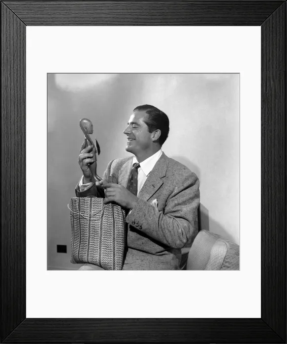 Framed Print : American film star Dana Andrews returned to London from the African jungle where location Framed Print : American film star Dana Andrews returned to London from the African jungle where location