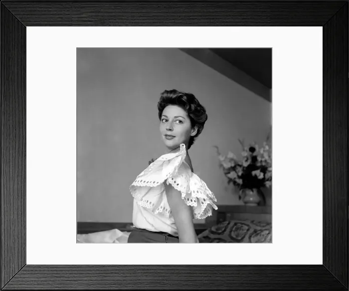 Framed Print : 27 year old French film actress Anne Vernon, photographed in her Savoy river suite