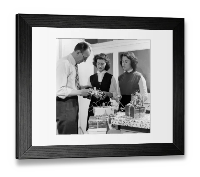 Framed Print : Occupations: Shop Assistants. Shop assistants seen here learning how to wrap Christmas Framed Print : Occupations: Shop Assistants. Shop assistants seen here learning how to wrap Christmas