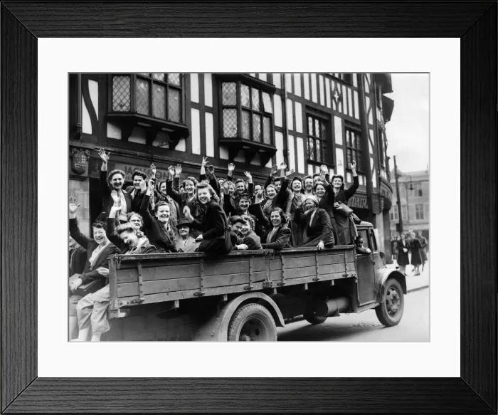 Framed Print : Women munition workers waving cheerfully as they move away to their factory on an army Framed Print : Women munition workers waving cheerfully as they move away to their factory on an army