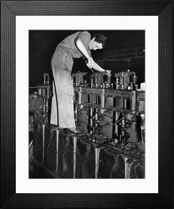 Framed Print : This woman is helping in the maintenance of a railway Diesel engine Framed Print : This woman is helping in the maintenance of a railway Diesel engine