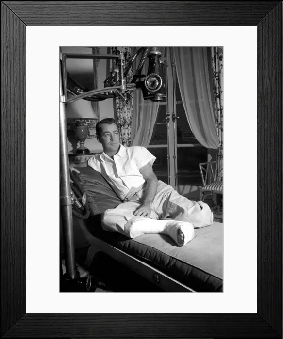 Framed Print : Film star Alan Ladd, who has injured his foot. October 1953 D6473-002 Framed Print : Film star Alan Ladd, who has injured his foot. October 1953 D6473-002