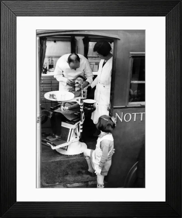 Framed Print : Shelia Webster aged 7 seen here at the Mobile Dentist Clinic at Bircotes