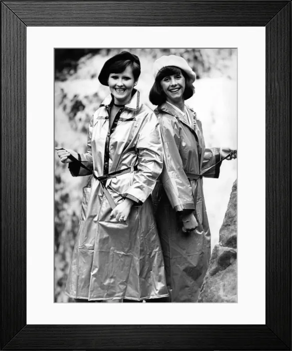 Framed Print : Models Pat and Joan don t mind the rain in their Jakie Ross macs both costing £ Framed Print : Models Pat and Joan don t mind the rain in their Jakie Ross macs both costing £
