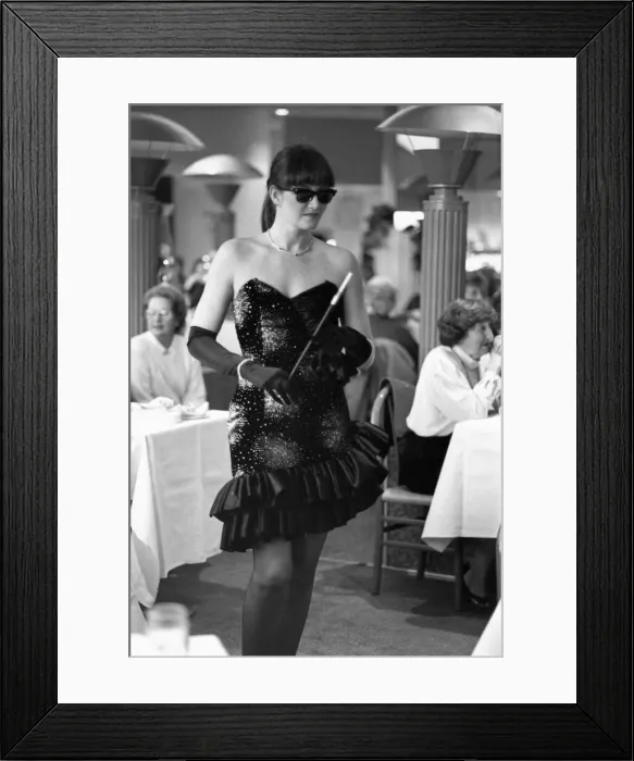 Framed Print : A model all ready for a party in this lavish evening dress