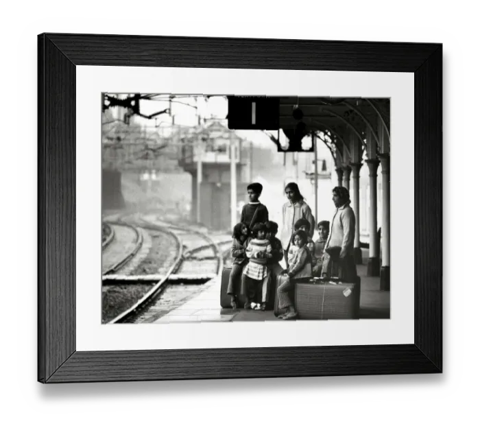 Framed Print : Asian immigrant family waiting at Bishops Stortford train station to travel to London