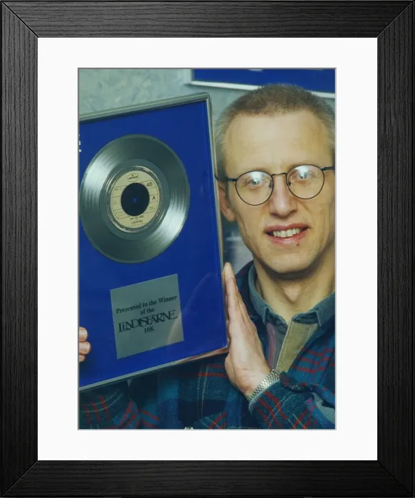 Framed Print : Ray Laidlaw of Lindisfarne, with the silver disc donated as a trophy for the Lindisfarne Framed Print : Ray Laidlaw of Lindisfarne, with the silver disc donated as a trophy for the Lindisfarne