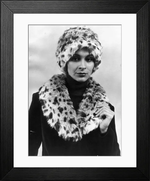 Framed Print : A model posing in the latest fake fur hat and scarf Framed Print : A model posing in the latest fake fur hat and scarf