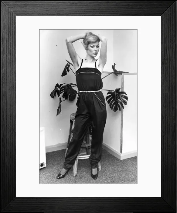 Framed Print : Julie wears a French blue velvour catsuit