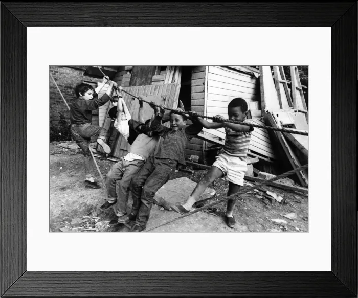 Framed Print : Children playing at an adventure playground in Peckham Road, Southwark
