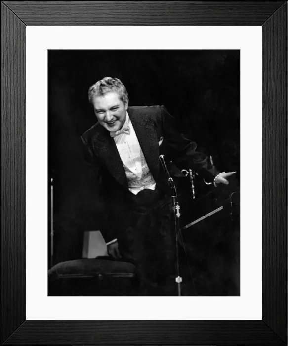 Framed Print : Applause so loud from the fans that Liberace leaves his piano