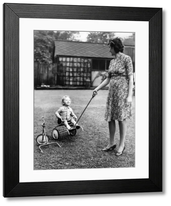 Framed Print : Paul Chapman, aged 2 years, of Manchester, was puzzled by the bits Framed Print : Paul Chapman, aged 2 years, of Manchester, was puzzled by the bits
