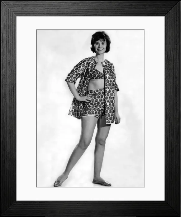 Framed Print : Woman wearing a patterned swimming costume. May 1962 P011068 Framed Print : Woman wearing a patterned swimming costume. May 1962 P011068
