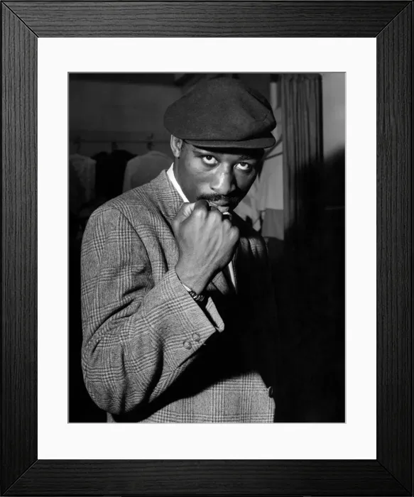 Framed Print : American boxer Randy Sandy poses with a clenched fist during his visit to Britain for an Framed Print : American boxer Randy Sandy poses with a clenched fist during his visit to Britain for an