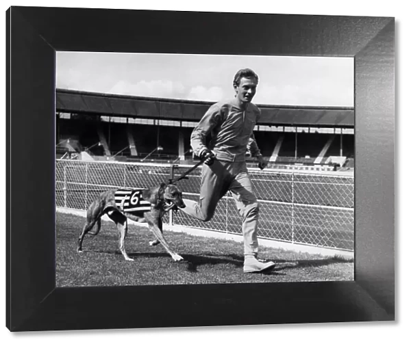 Brain Hewson is here seen lapping the track with his greyhound '