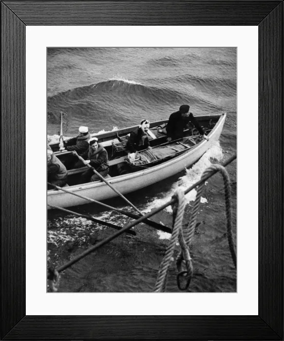 Framed Print : World War II: Shipping survivors from a boat attack on an Atlantic convoy Framed Print : World War II: Shipping survivors from a boat attack on an Atlantic convoy