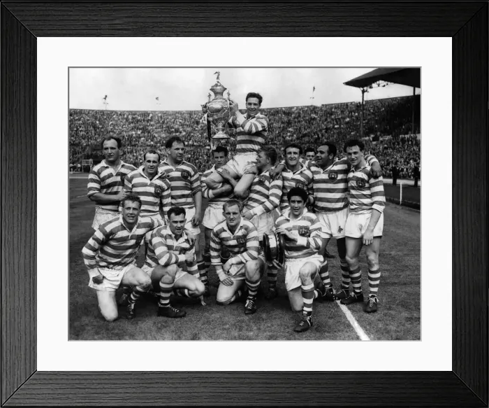 Framed Print : E. Asthon, Wigan captain holds the cup aloft, when he was being chaired by his colleagues