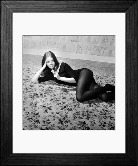 Framed Print : Picture of professional model Miss Jan De Fraine, aged 21 lying down wearing black top