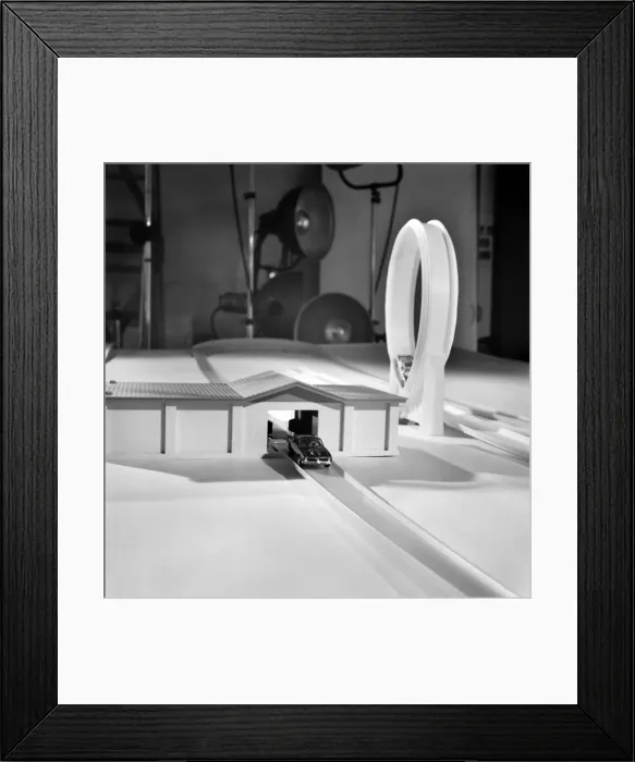 Framed Print : A car racing around a track, part of the Corgi Rockets racing track. November 1969 Z10838 Framed Print : A car racing around a track, part of the Corgi Rockets racing track. November 1969 Z10838