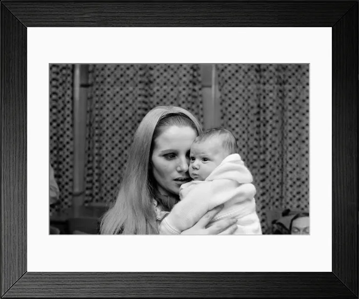 Framed Print : A woman with her baby girl. November 1969 Z10895 Framed Print : A woman with her baby girl. November 1969 Z10895
