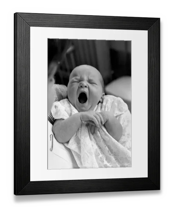Framed Print : Baby girl yawns in the childrens hospital in Myrtle street, Liverpool Framed Print : Baby girl yawns in the childrens hospital in Myrtle street, Liverpool