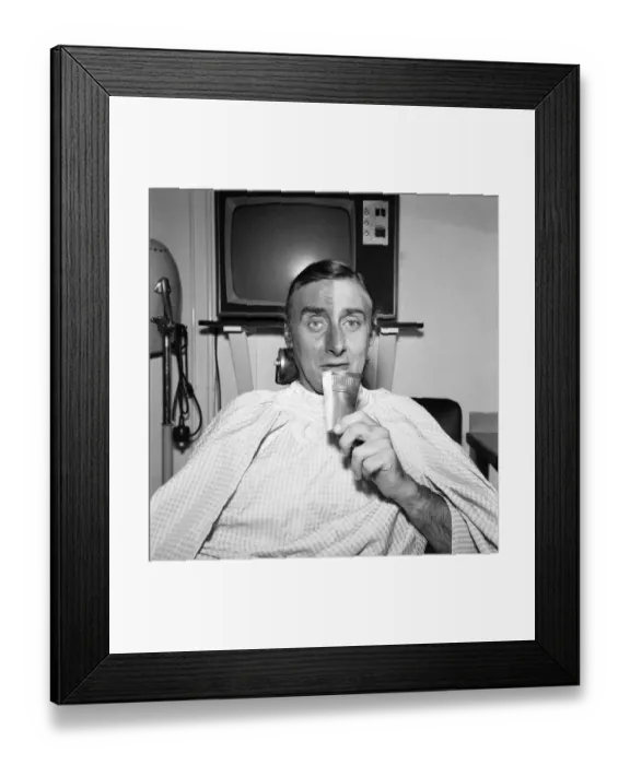 Framed Print : Spike Milligan making up for his part in his new TV series as a Pakistani
