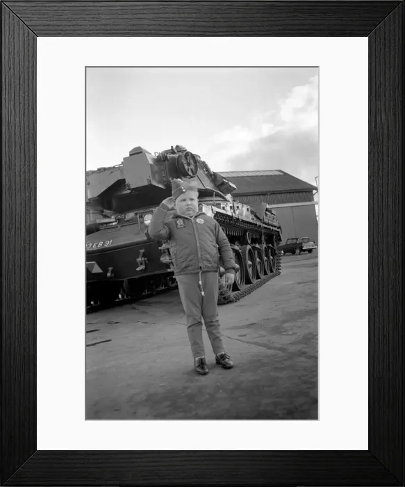Framed Print : Children humour military. Six year old boy wearing an army cap Framed Print : Children humour military. Six year old boy wearing an army cap