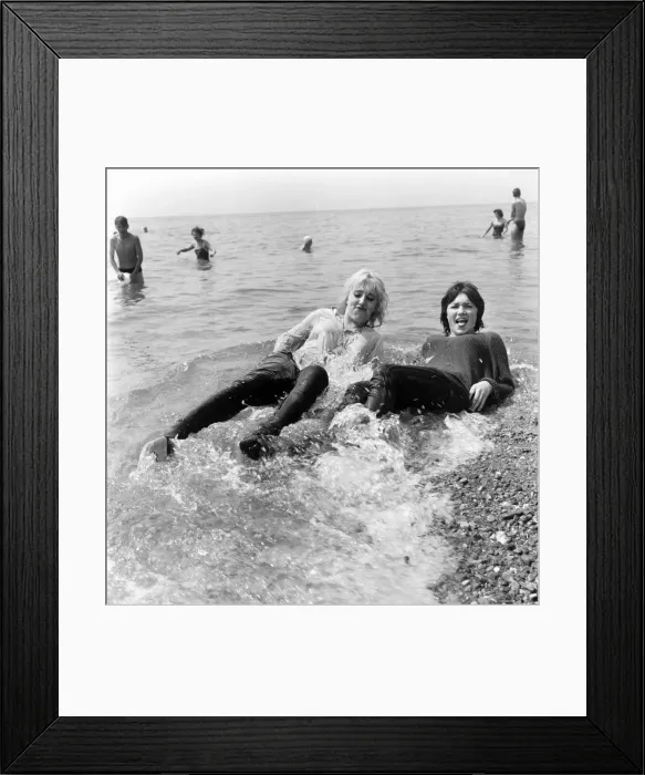 Framed Print : Beach scenes at Brighton. Sylvia Worsford and Margaret Kenneavy. June 1960 M4299