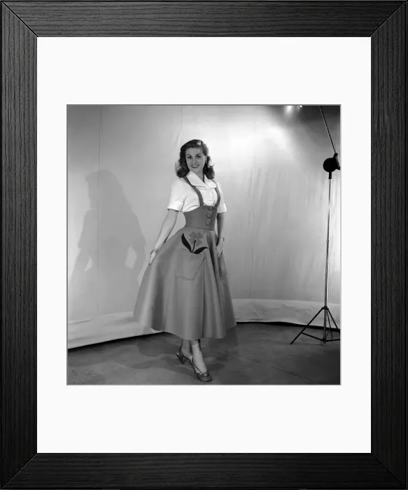 Framed Print : Clothing: Fashion: Skirts model wearing felt skirt. October 1953 D5999-001 Framed Print : Clothing: Fashion: Skirts model wearing felt skirt. October 1953 D5999-001