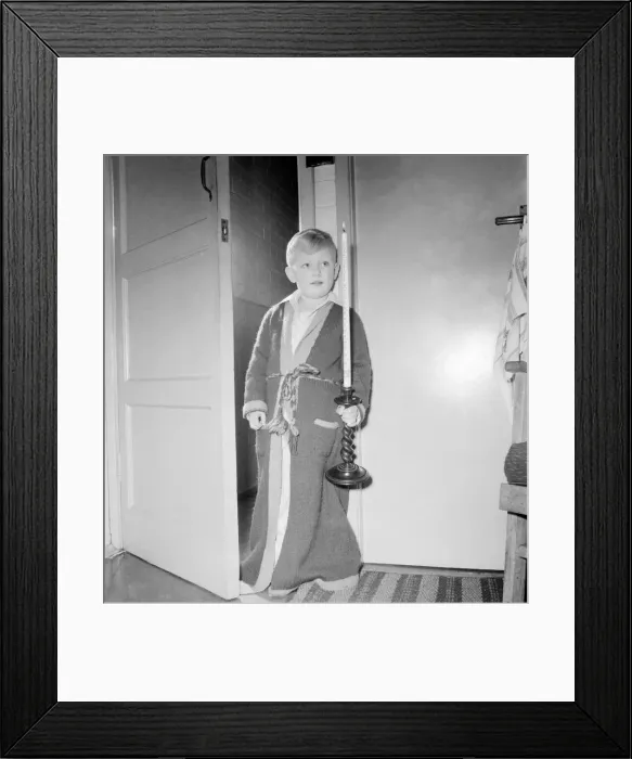 Framed Print : A small boy holding an advent calander candle. November 1953 D6818 Framed Print : A small boy holding an advent calander candle. November 1953 D6818