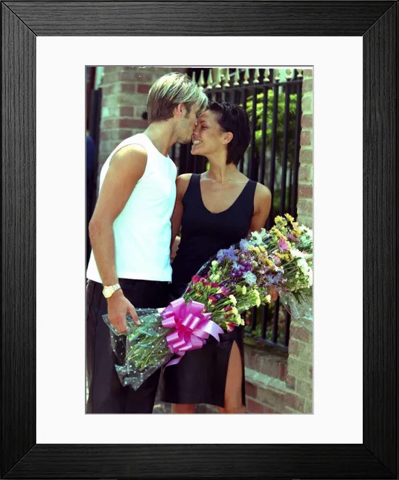 Framed Print : David Beckham kissing Victoria Adams July 1999 on the nose outside their Framed Print : David Beckham kissing Victoria Adams July 1999 on the nose outside their
