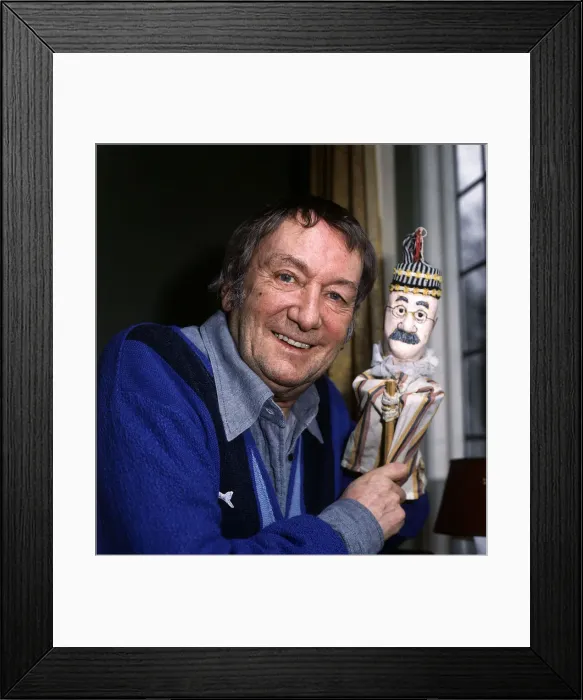 Framed Print : Johnny Speight 1981 holding Alf Garnett puppet Framed Print : Johnny Speight 1981 holding Alf Garnett puppet
