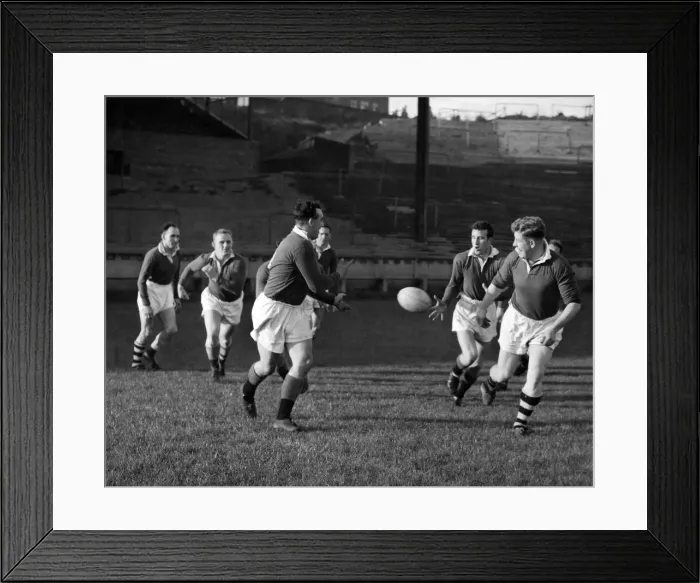 Framed Print : Wigan players practice passing tactics during training today. October 1957 P012584