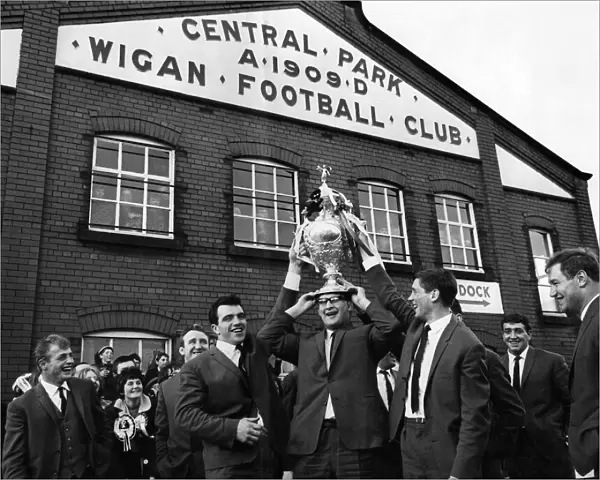 Wigan Rugby F. C. return. The triumphant Wigan Rugby Team parade outside their ground at