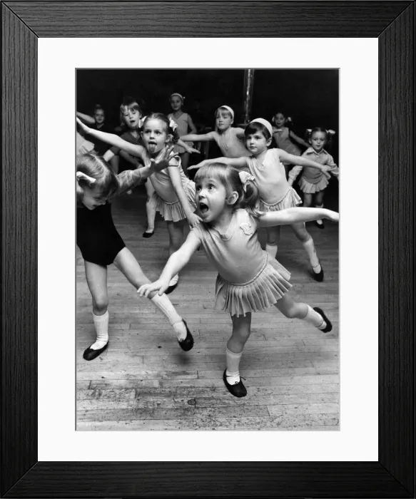 Framed Print : Dancing Children: 4-years-old Claire Tait from Dalston leaps into a ballet pose