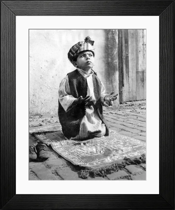 Framed Print : Around the corner is the hum and bustle of a busy city. But in a quiet lane a little Framed Print : Around the corner is the hum and bustle of a busy city. But in a quiet lane a little
