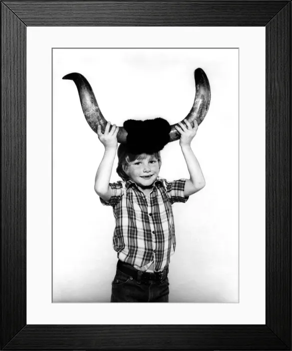 Framed Print : Taurus: Nicholas Carn aged 6. Bulls horns. October 1980 P012695 Framed Print : Taurus: Nicholas Carn aged 6. Bulls horns. October 1980 P012695