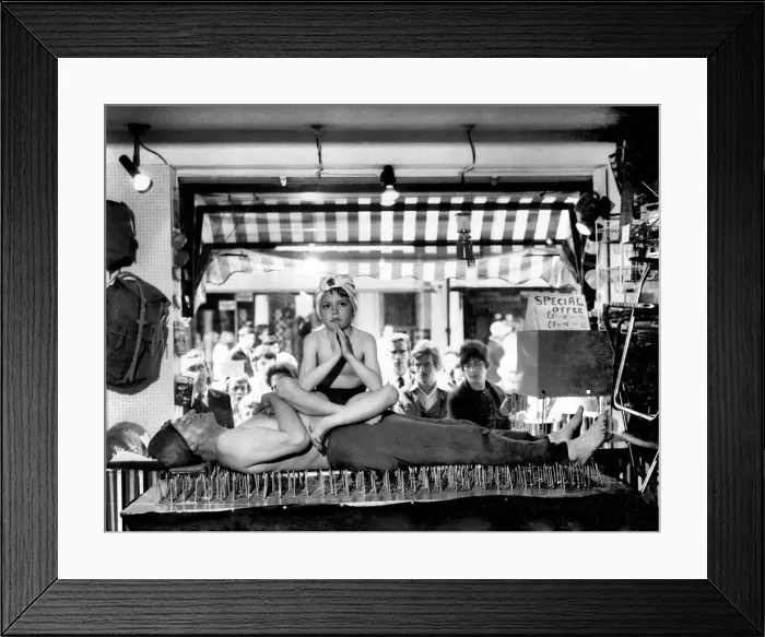 Framed Print : A Beginner in the Yoga business: 8-year-old Michael Carew sits