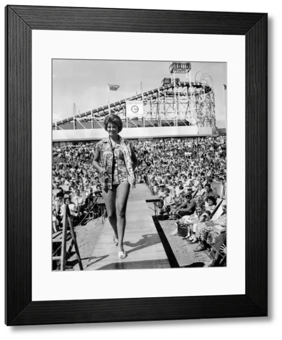 Framed Print : Women: Beauty contests mirror beach fashion show. June Marshall models a French cotton