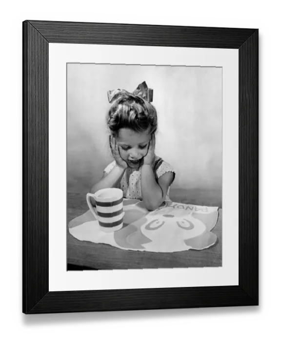 Framed Print : No crying over split milk: This childs table mat has plenty of room for a plate