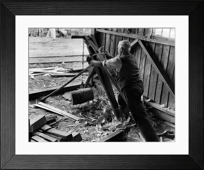 Framed Print : Carving the fence: The last process in the production of the Oaken fence