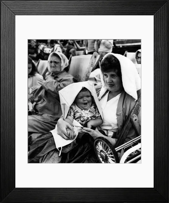 Framed Print : Who cares about the rain-when theres a towel and a pram apron about Framed Print : Who cares about the rain-when theres a towel and a pram apron about