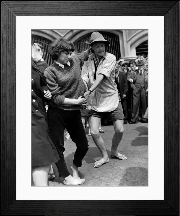 Framed Print : Terry Gray, aged 20 of Crookham, Hants, in shirt and sandals dances with Ann Buckridge of Framed Print : Terry Gray, aged 20 of Crookham, Hants, in shirt and sandals dances with Ann Buckridge of