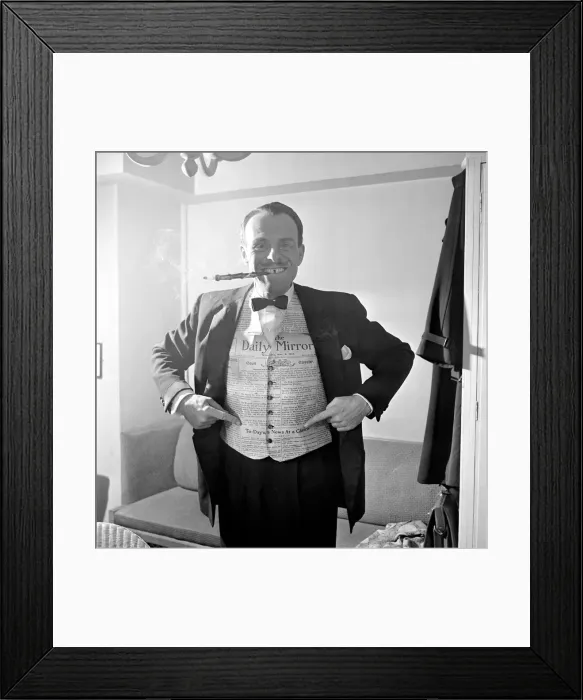 Framed Print : Terry Thomas tries out the waistcoat designed using the Daily Mirror at the Palladium Framed Print : Terry Thomas tries out the waistcoat designed using the Daily Mirror at the Palladium
