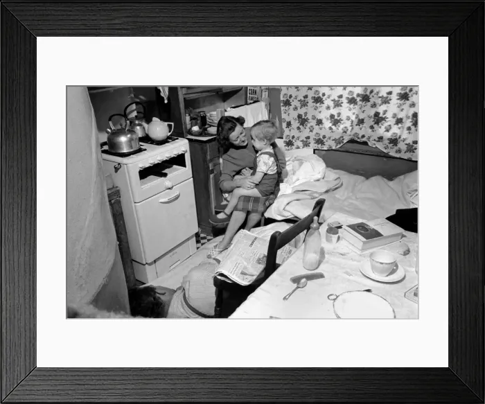 Framed Print : In Paddington three families share a terrace house. The two bedroom house means that one Framed Print : In Paddington three families share a terrace house. The two bedroom house means that one